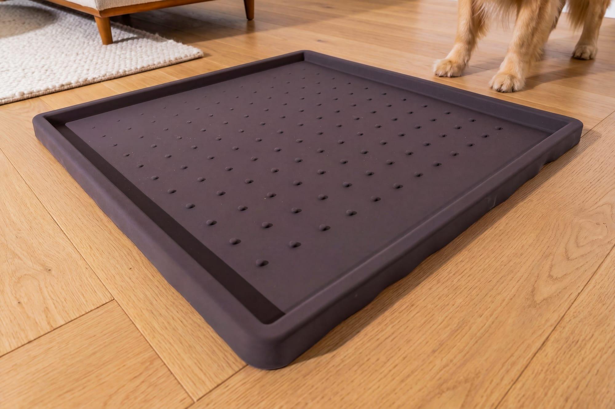 The FloorMate's smooth, non-porous silicone surface after a rinse