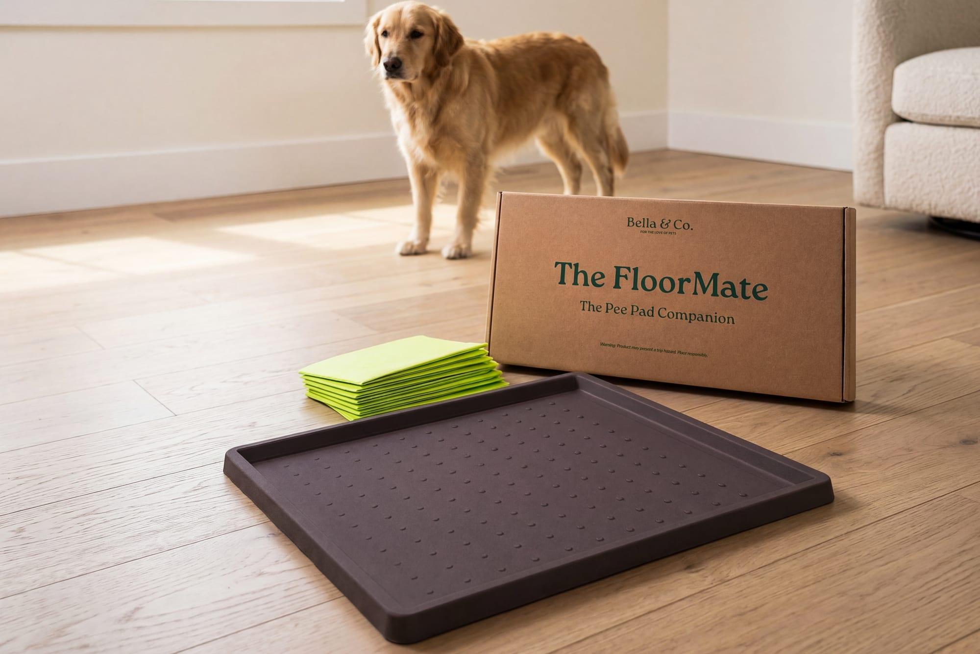 The FloorMate on a wood floor, with its anti-slip base and raised containment wall