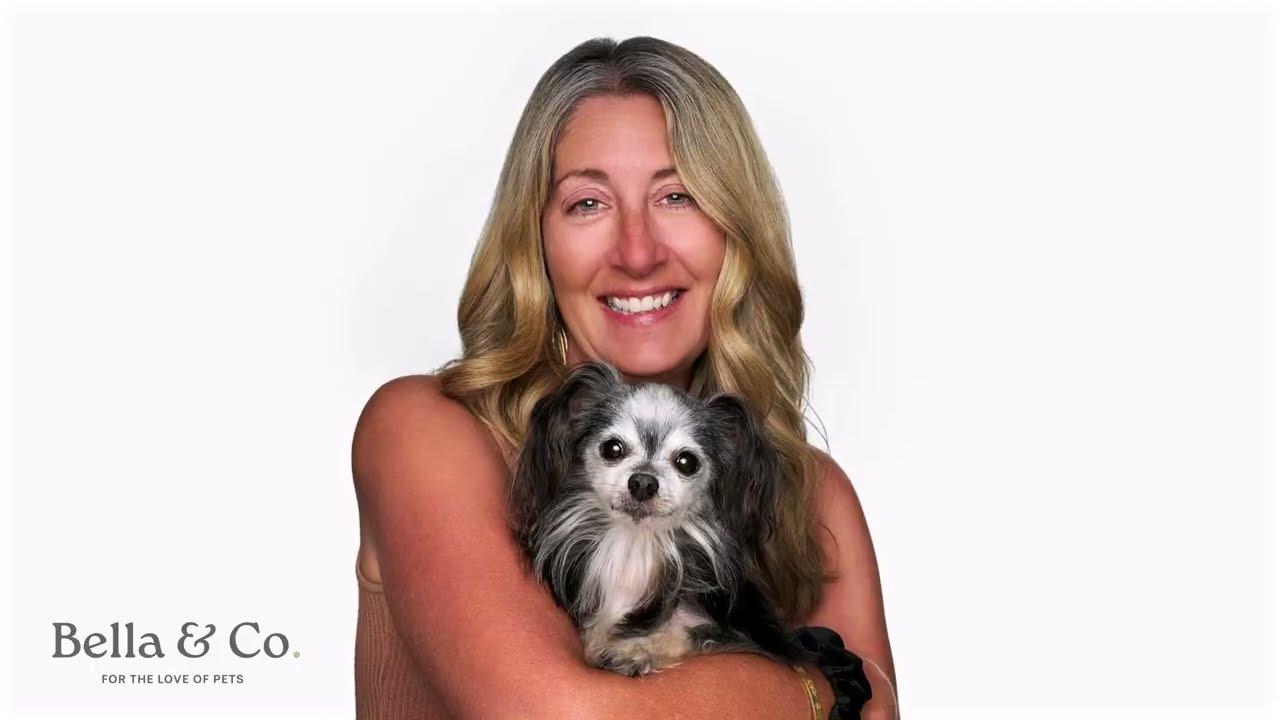 Nadine Oliveri, founder of Bella & Co., holding her rescue chihuahua Bella
